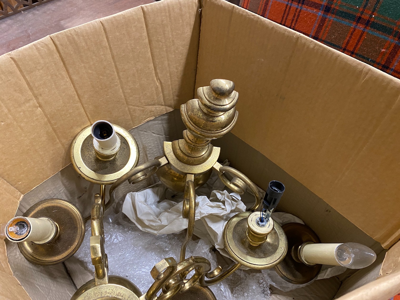 A Dutch style brass six branch electrolier, height 78cm and four similar wall lights
